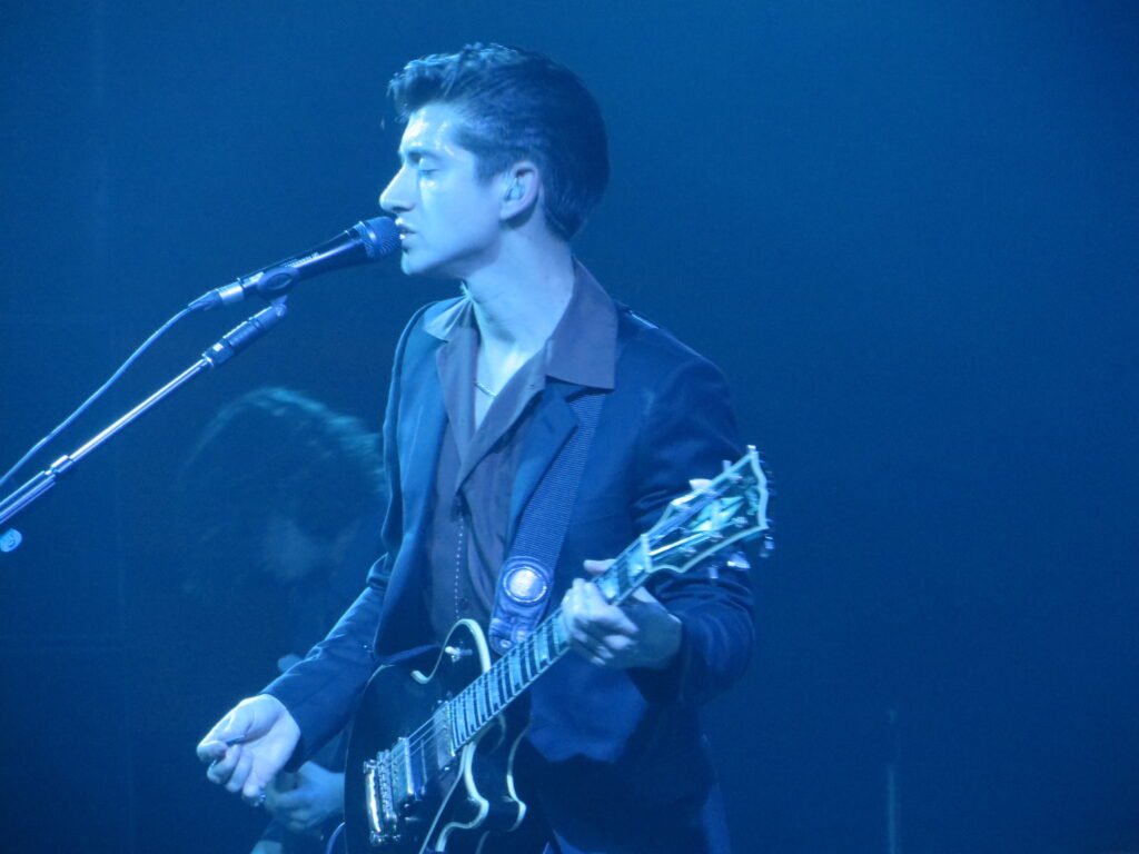 Alex Turner of Arctic Monkeys performs during a tour stop in Toronto, Ontario.